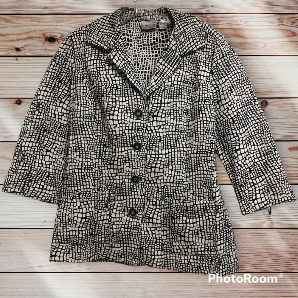 Chico’s size 1 black and white mid hip length blazer suit jacket. Machine wash.